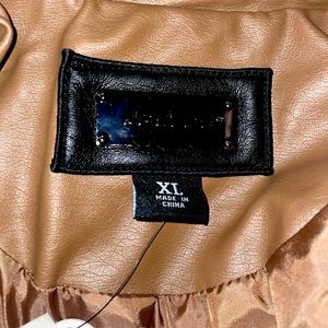Zip up leather tan jacketAnd vegan
